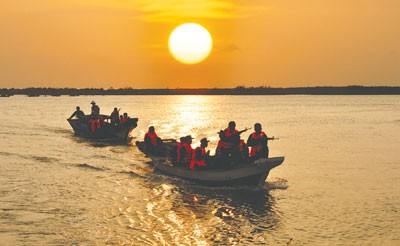 Soldiers conduct the patrol on the sea